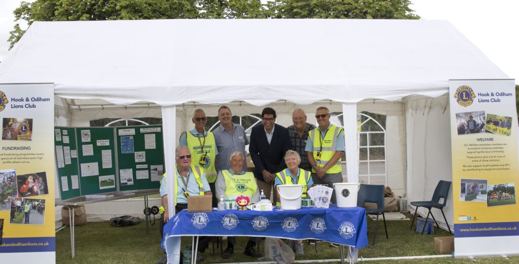 Hook Village Show 2022 -Picture of some of the Hook & Odiham Lions Club, Hook Parish Council and Ranil Jayawardena MP at the information point at the Hook Village Show